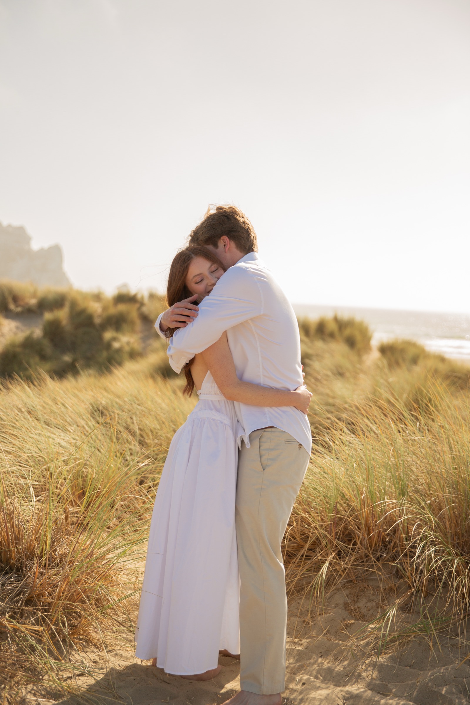 Cole and Bridget — Coastal engagement portrait
