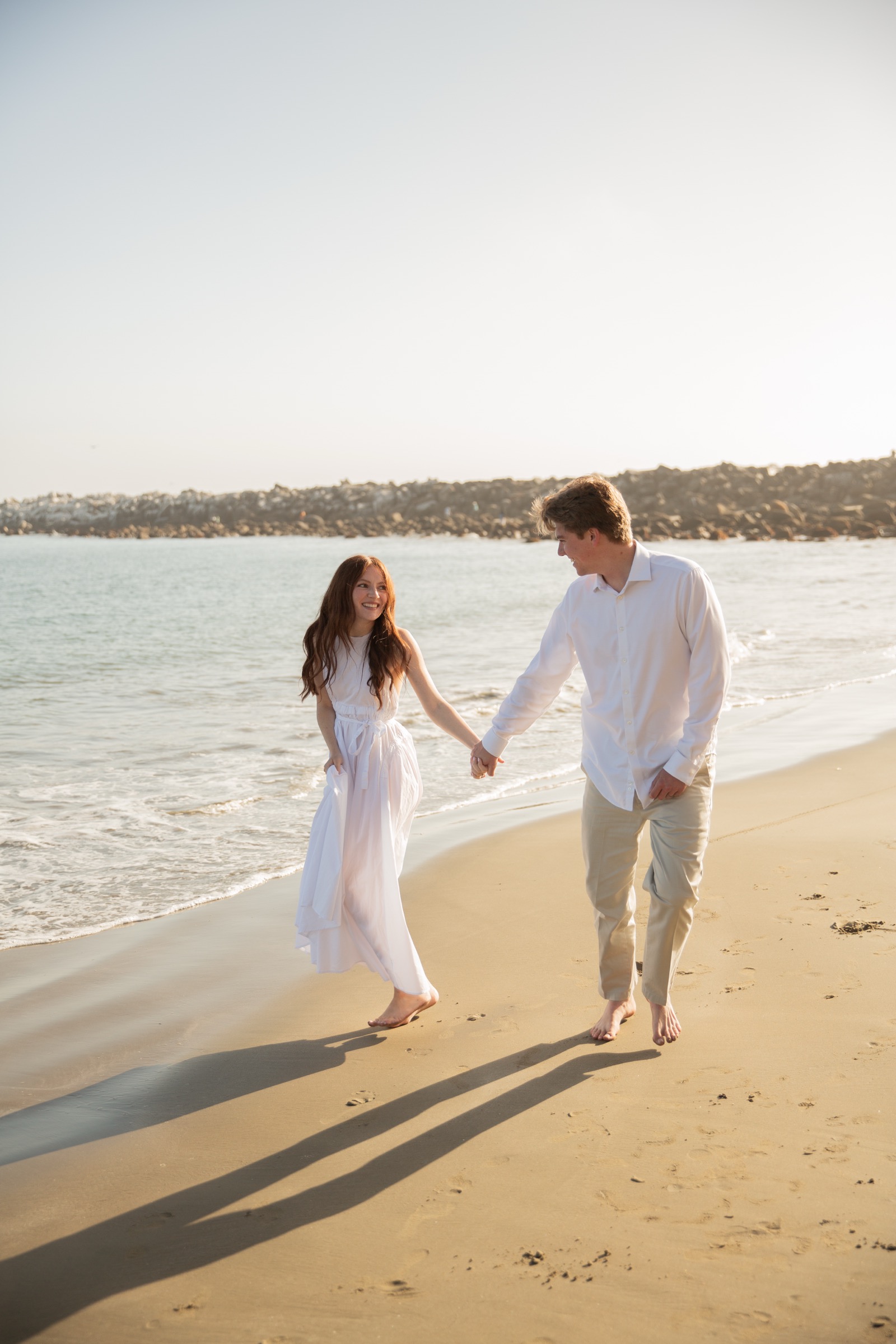 Cole and Bridget — Coastal engagement portrait