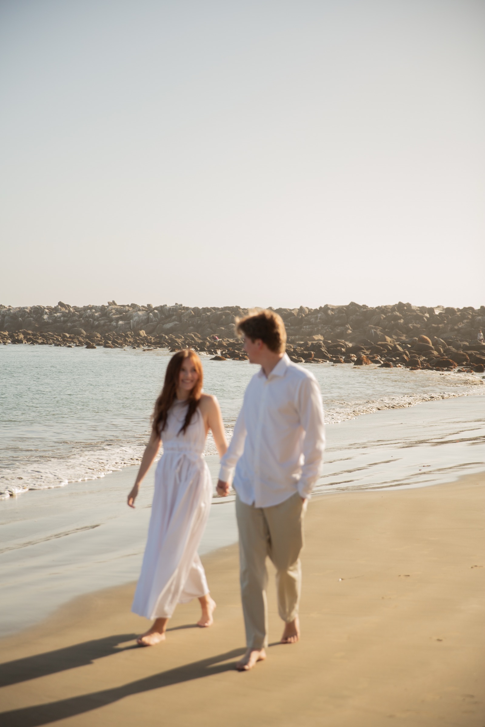 Cole and Bridget — Coastal engagement portrait