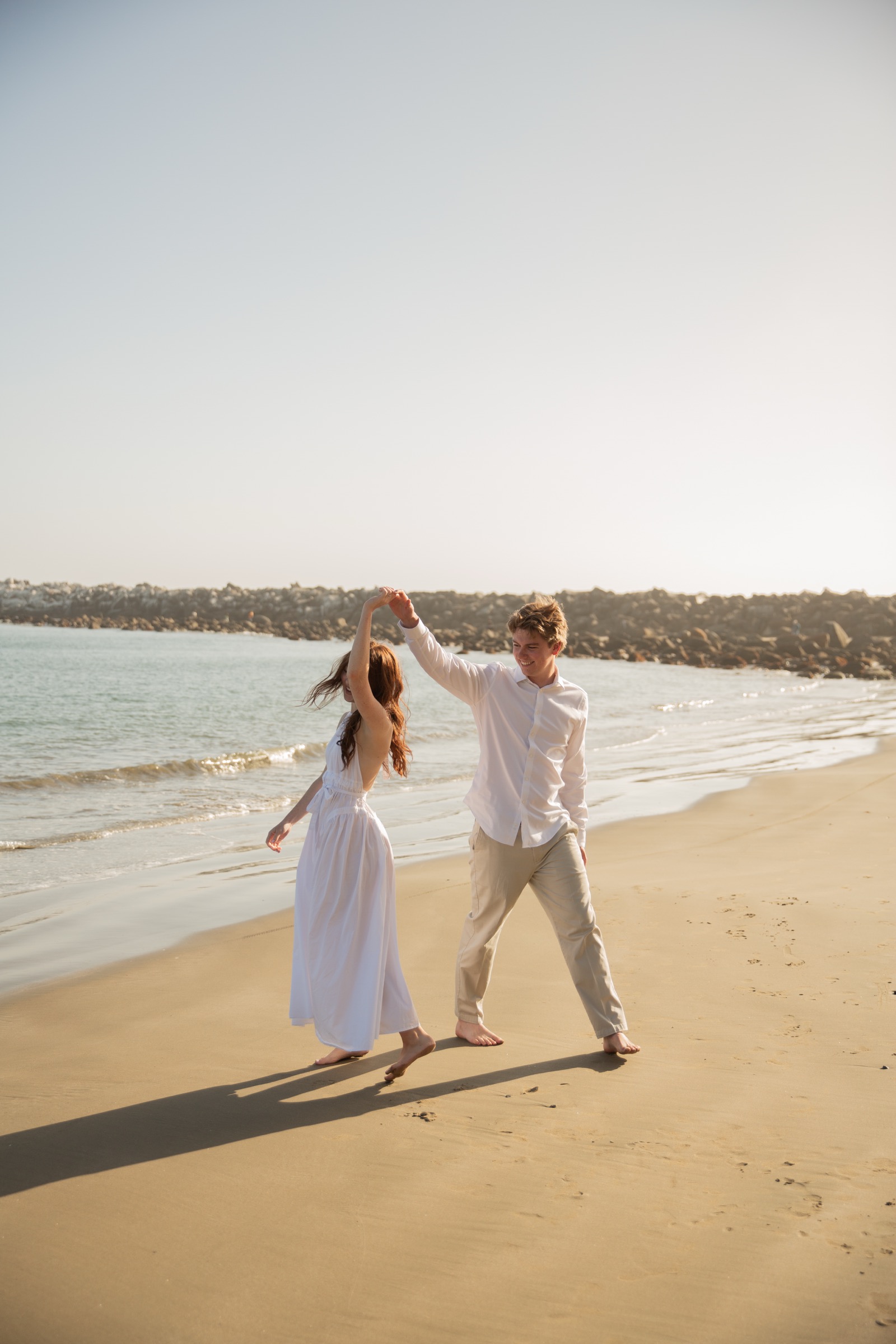 Cole and Bridget — Coastal engagement portrait