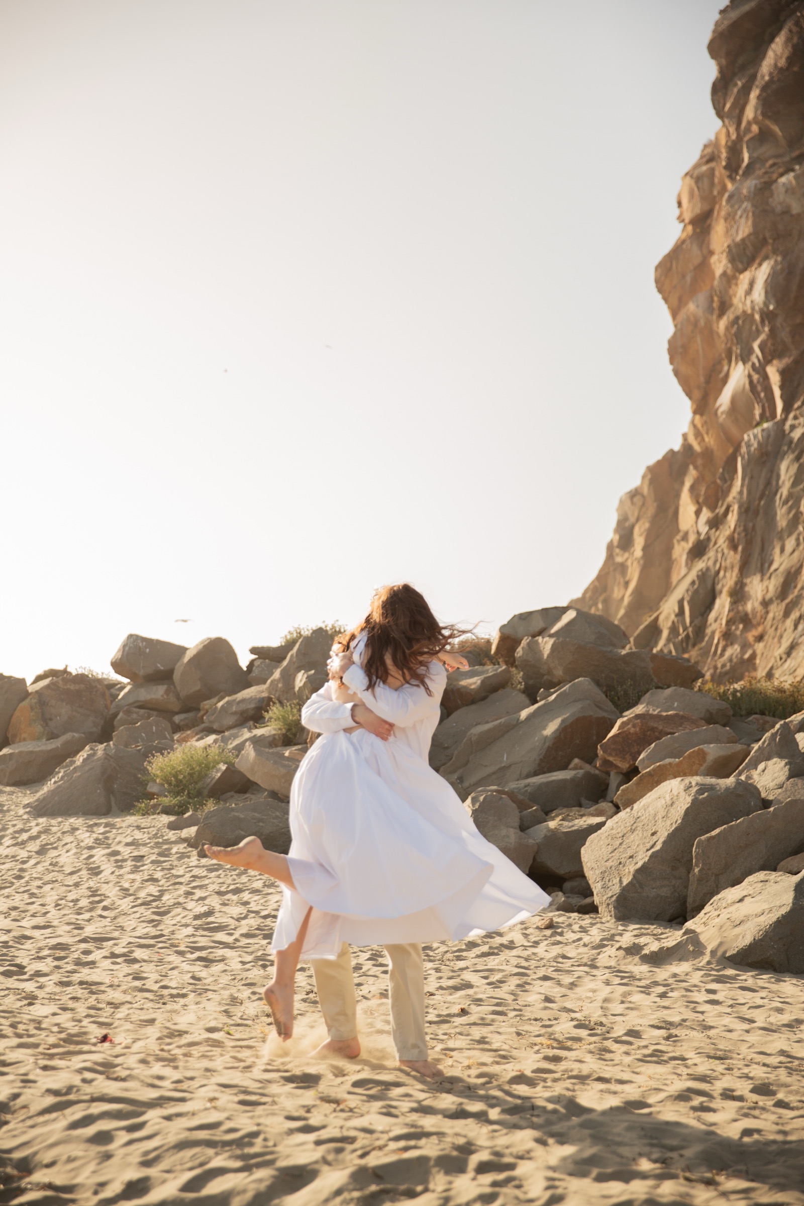Cole and Bridget — Coastal engagement portrait