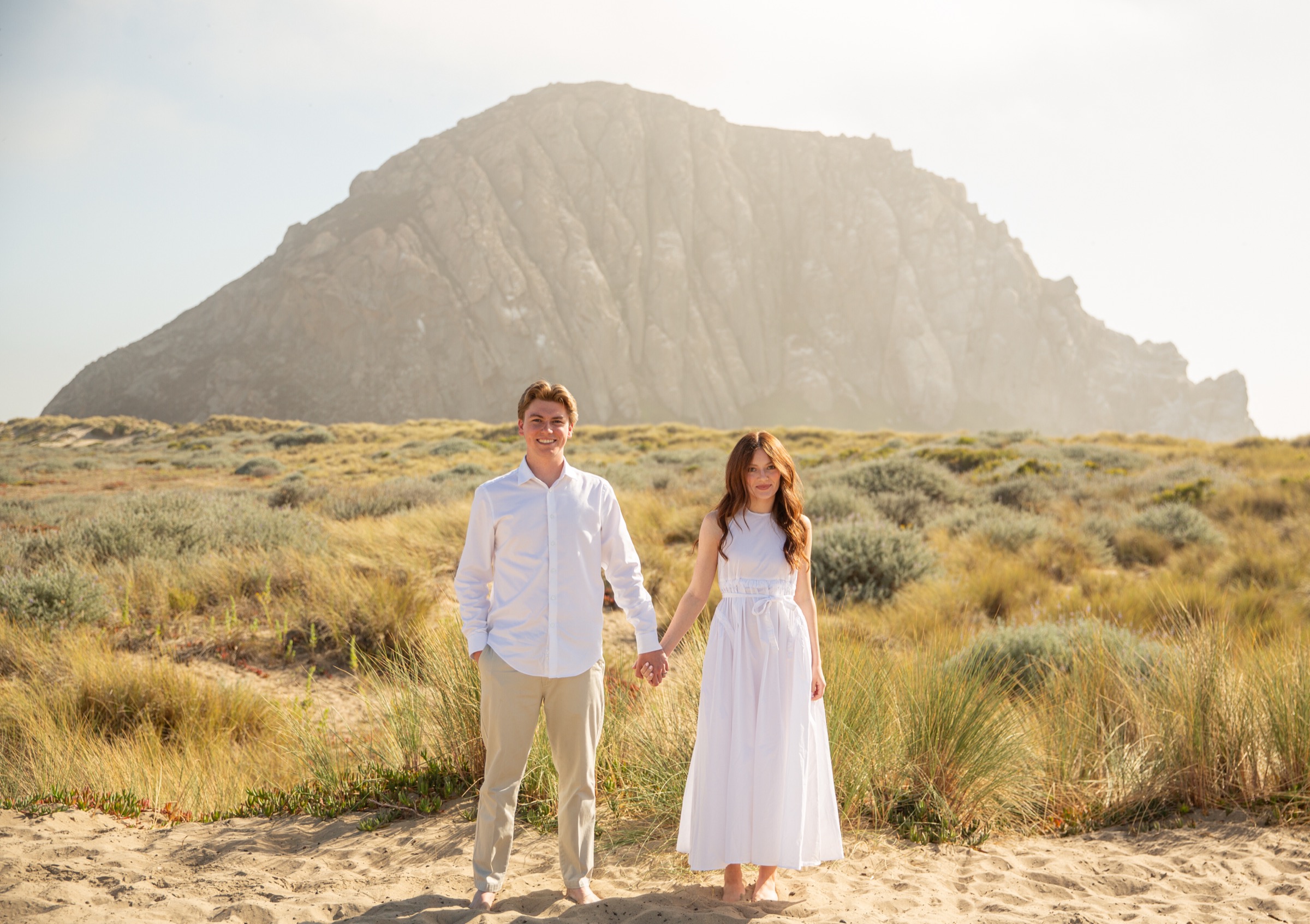 Cole and Bridget together in the coastal landscape