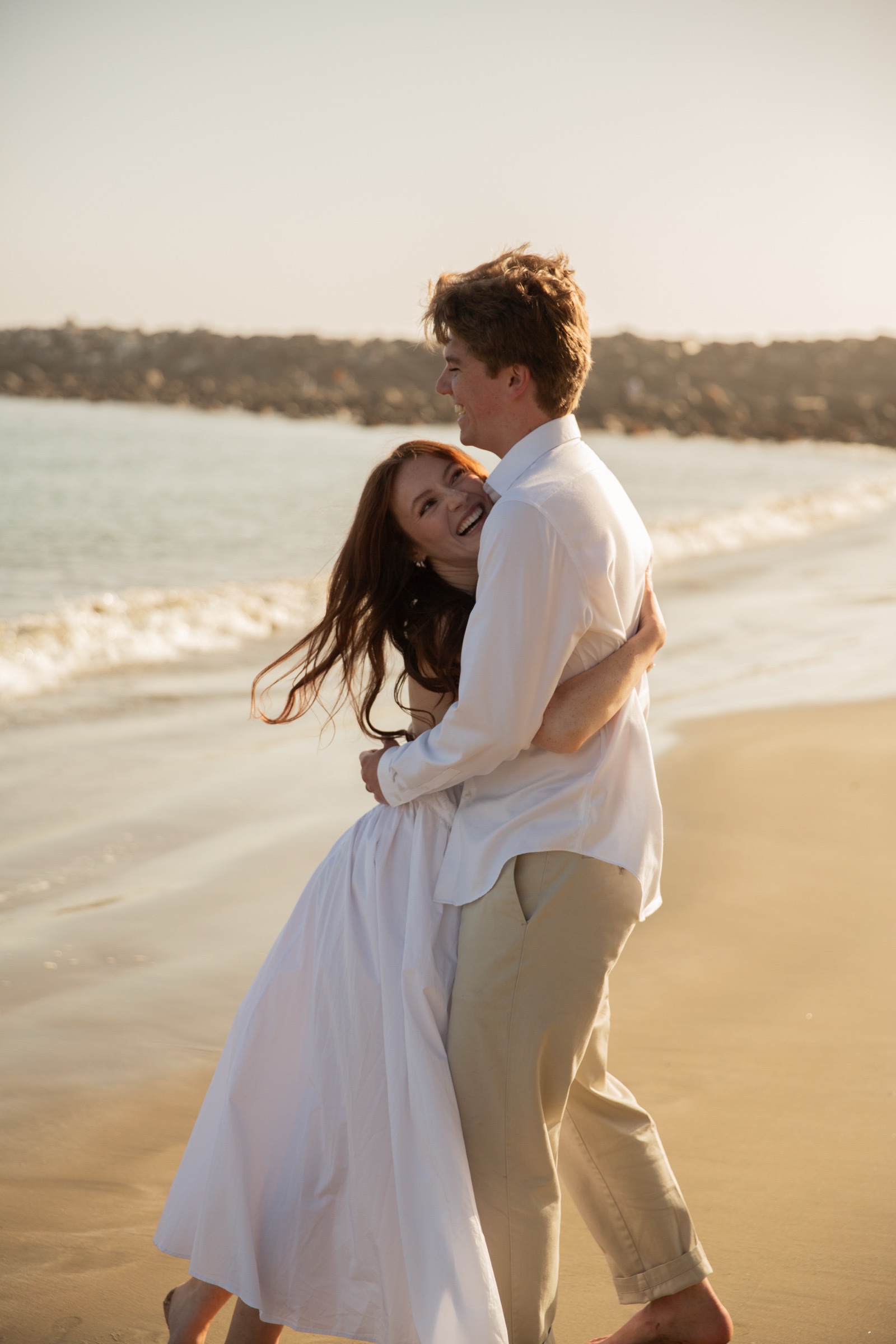 Cole and Bridget — Coastal engagement portrait