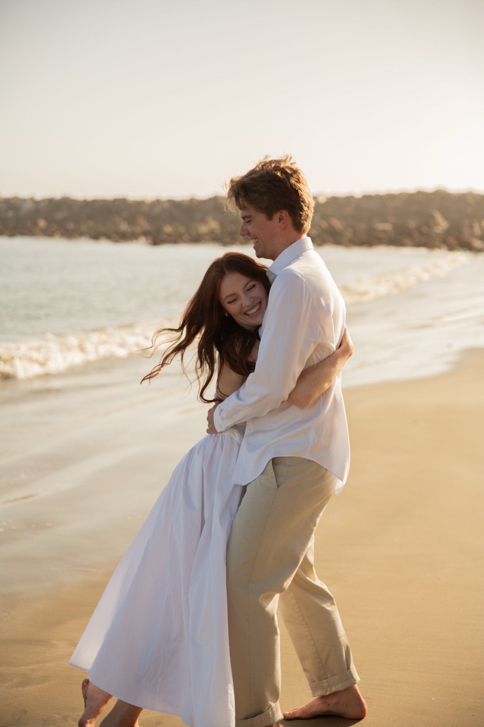 Cole and Bridget — Coastal engagement portrait