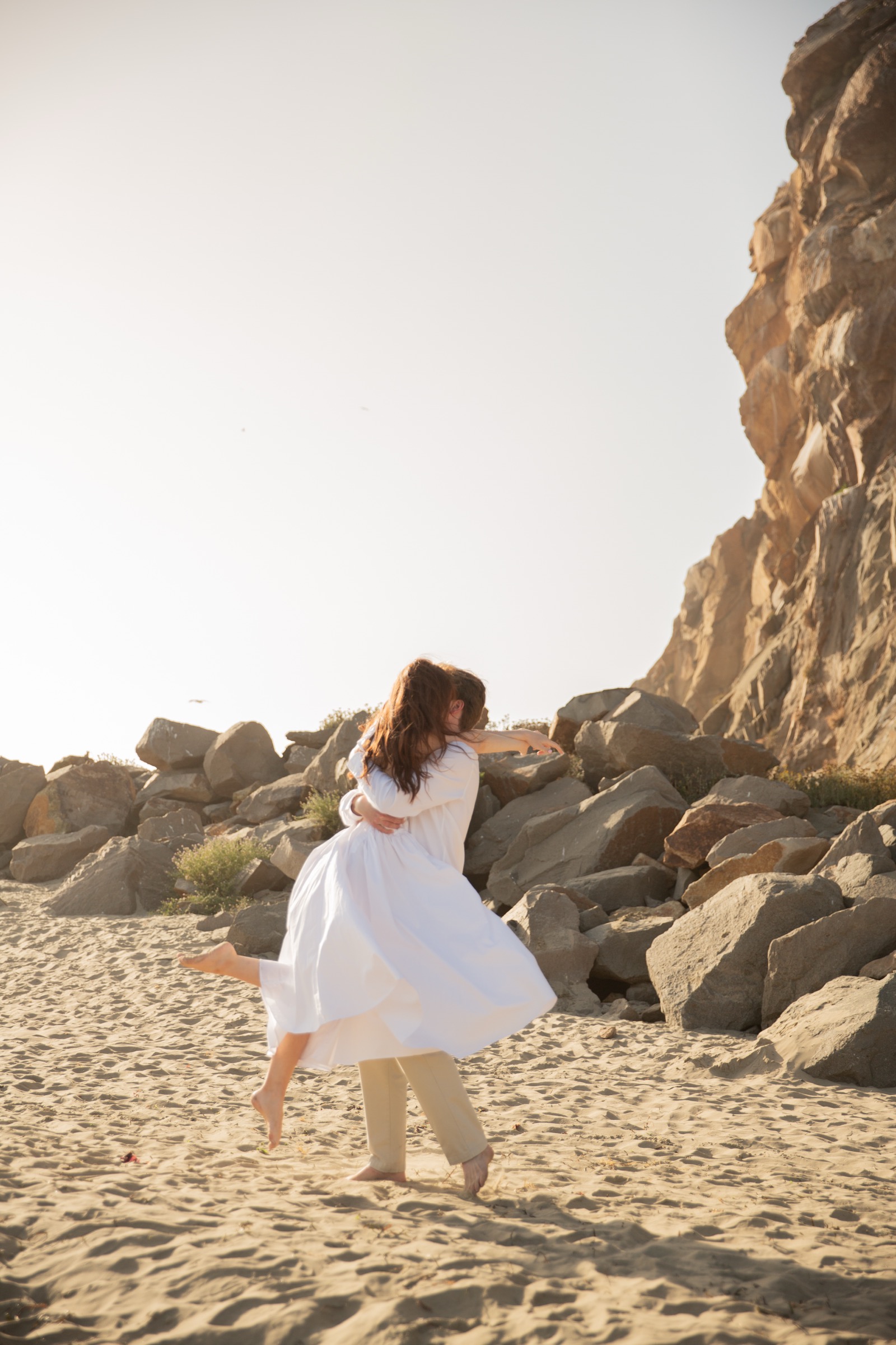 Cole and Bridget — Coastal engagement portrait
