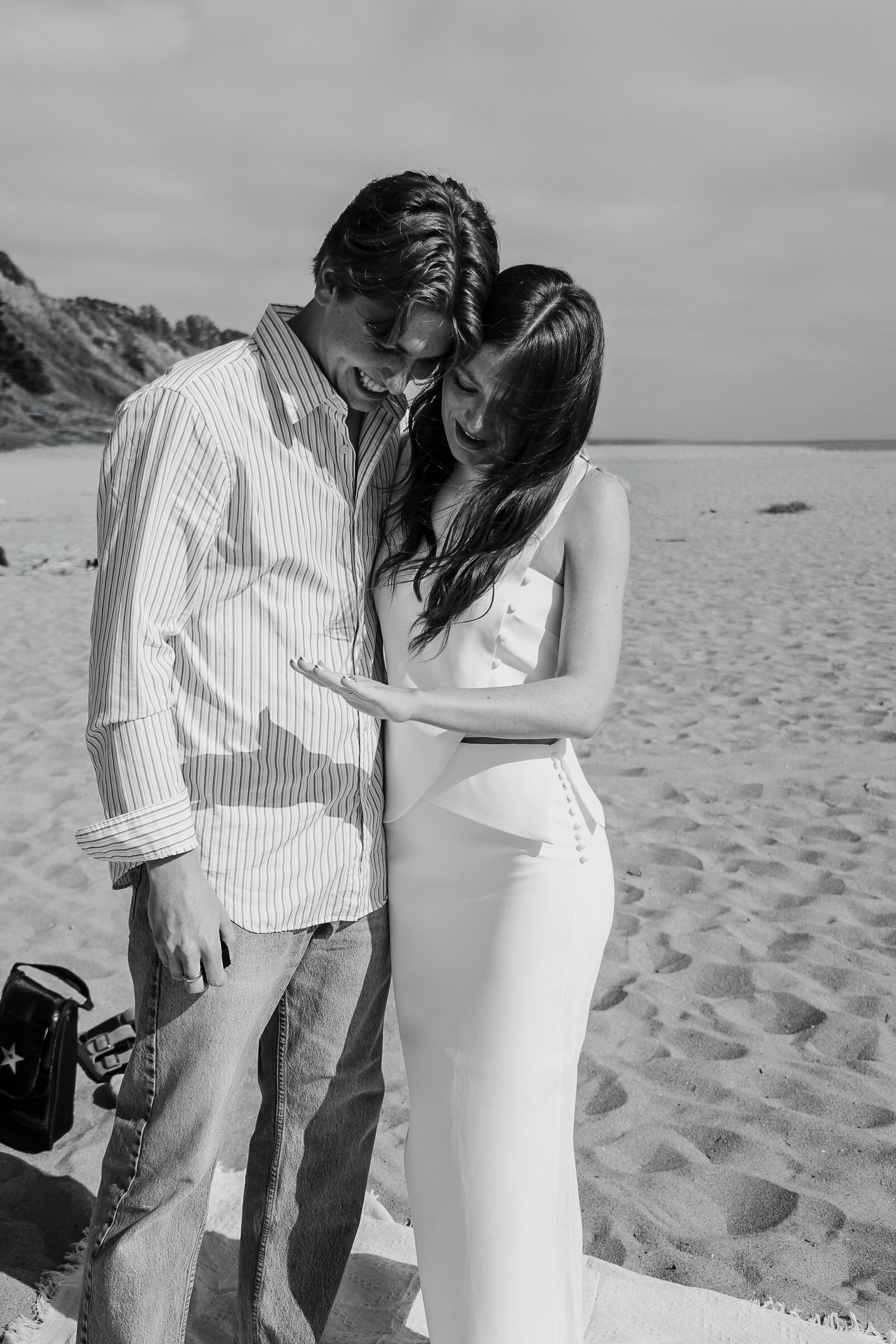Cole and Bridget — Beach engagement moment