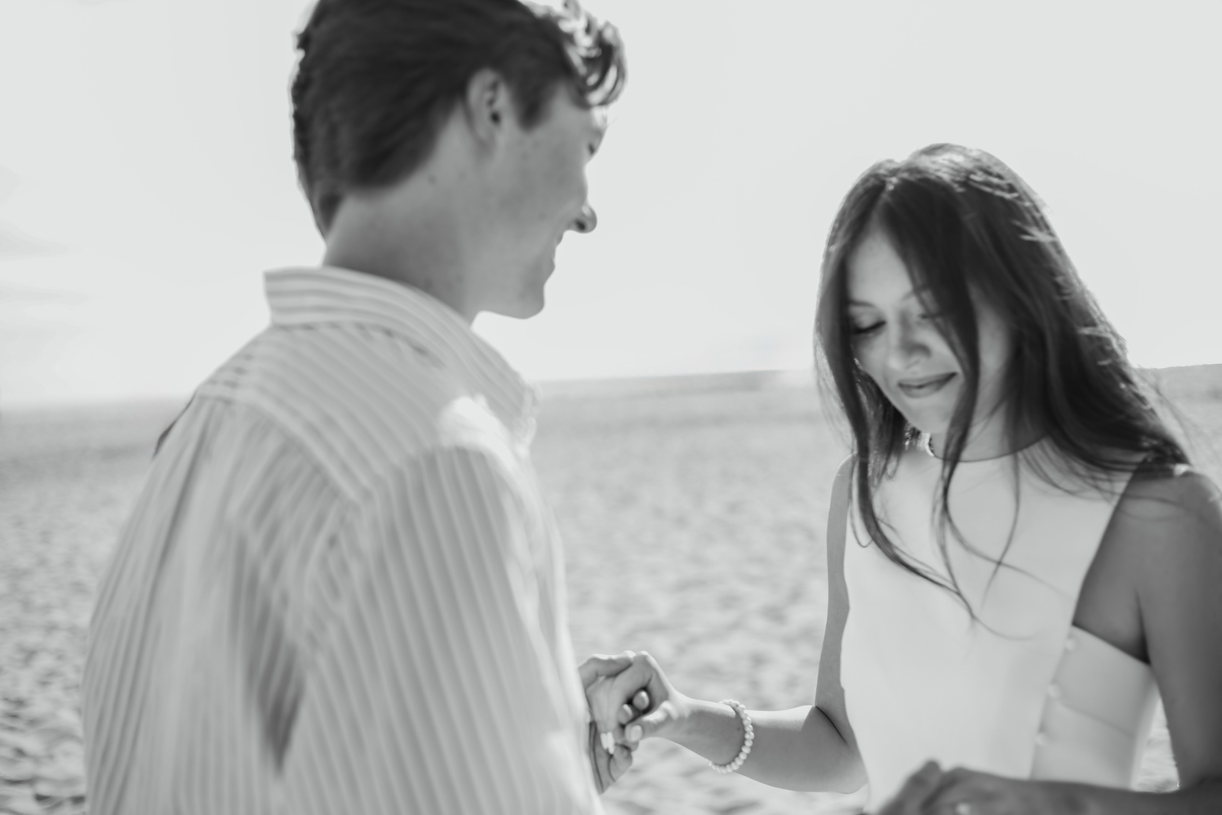 Cole and Bridget — Beach engagement moment