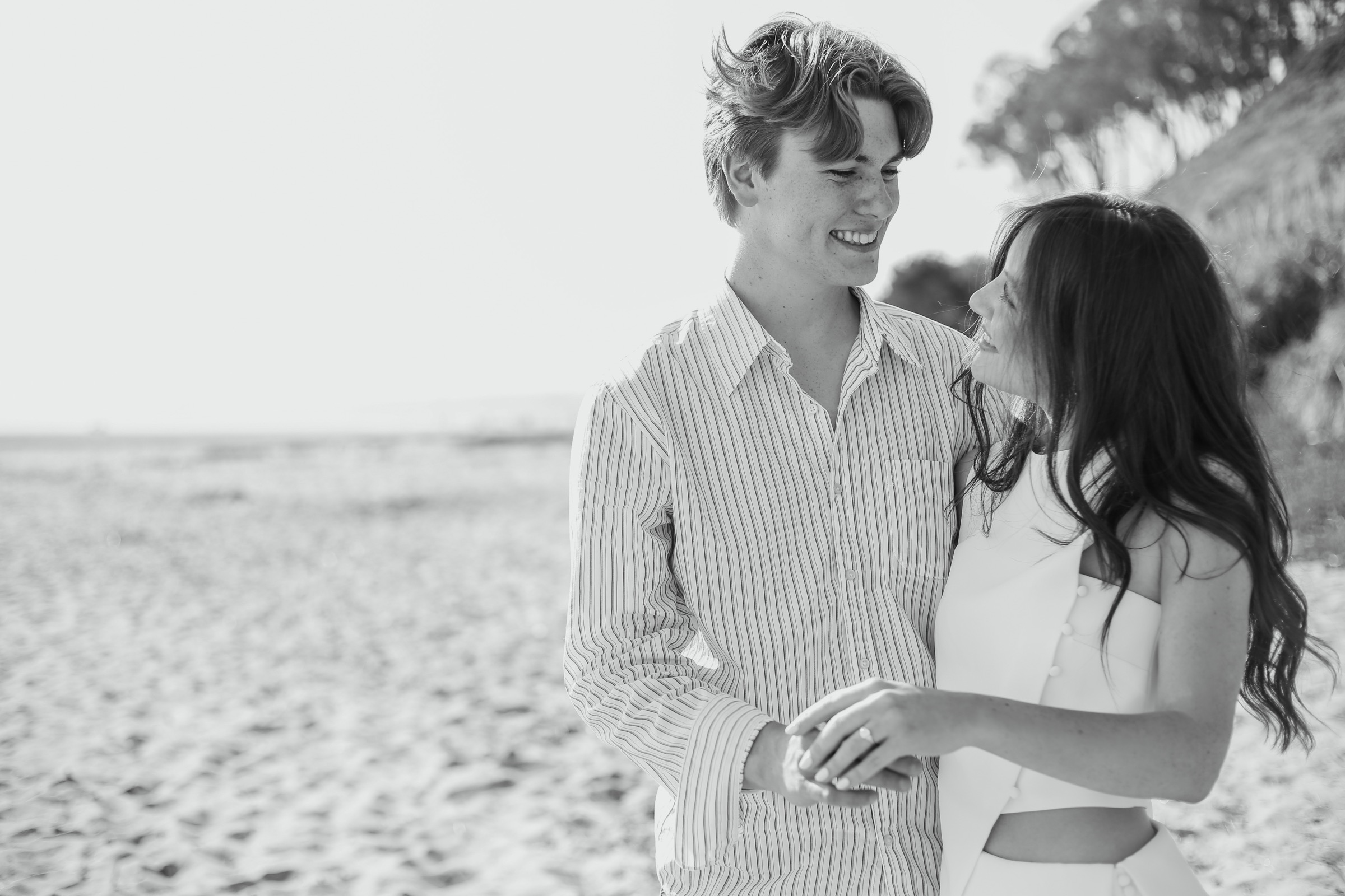 Cole and Bridget — Beach engagement moment