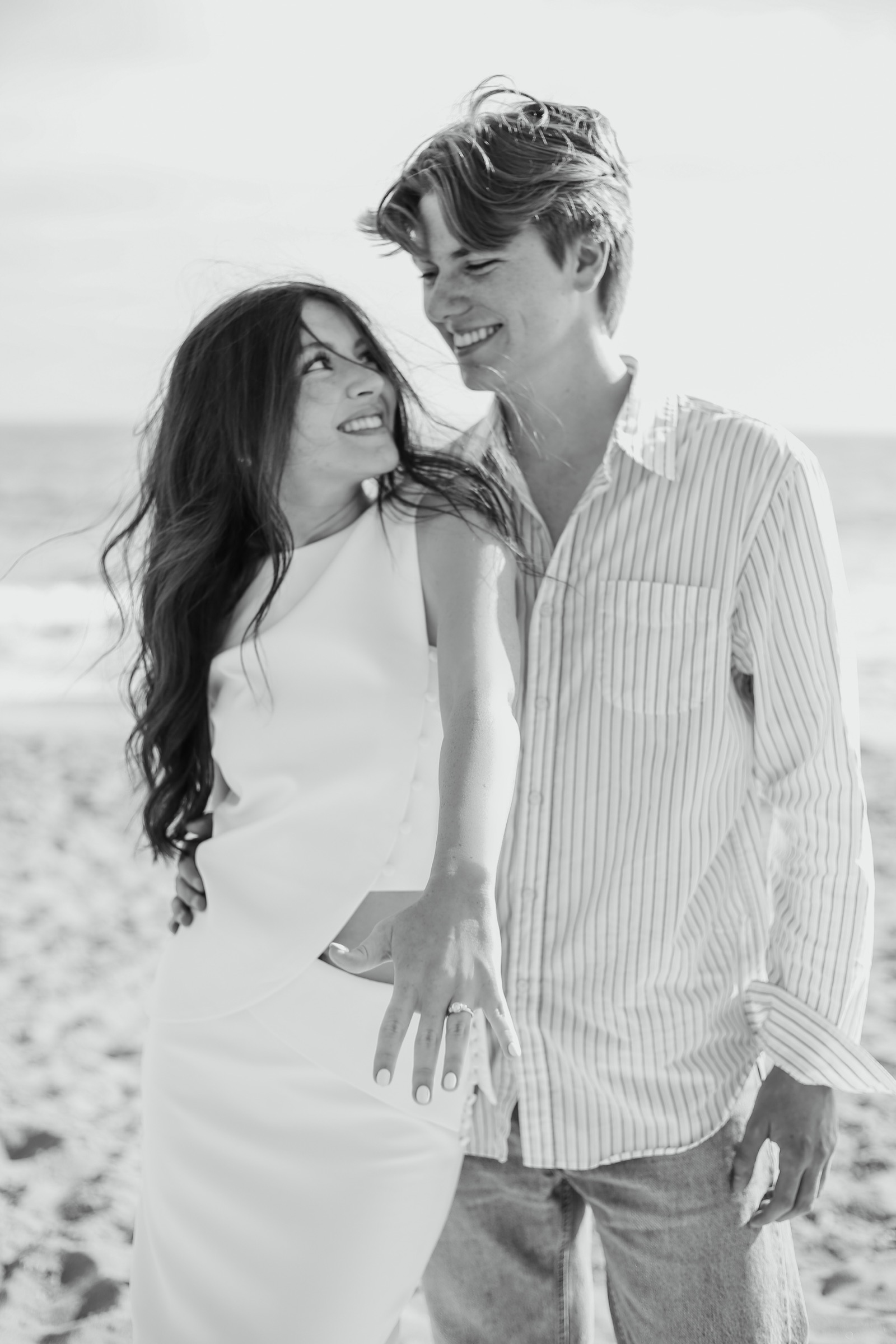 Cole and Bridget — Beach engagement moment